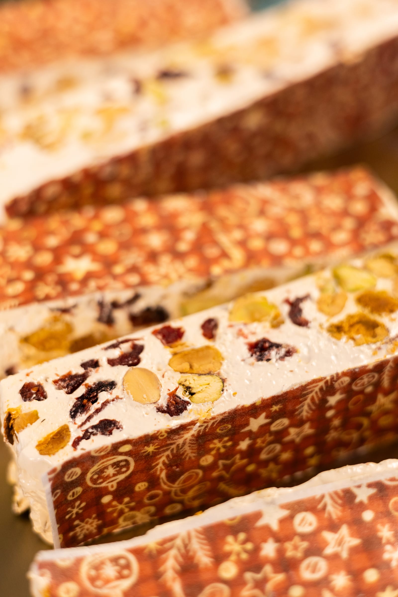 Close-up of nougat studded with pistachios, almonds and cranberries
