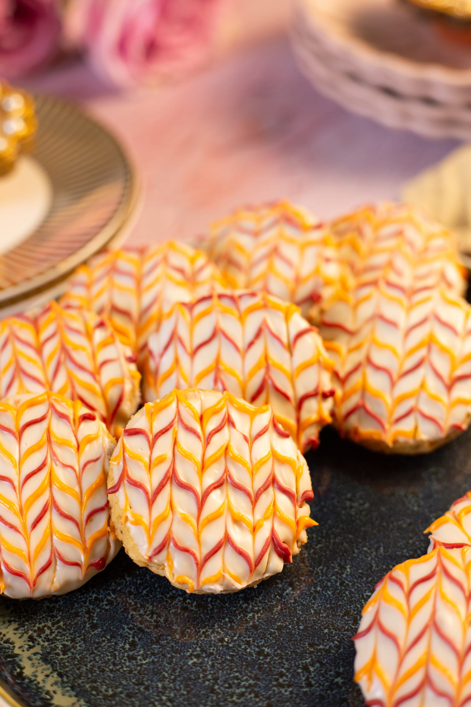 Close-up of the biscuits' pink and orange chevron icing