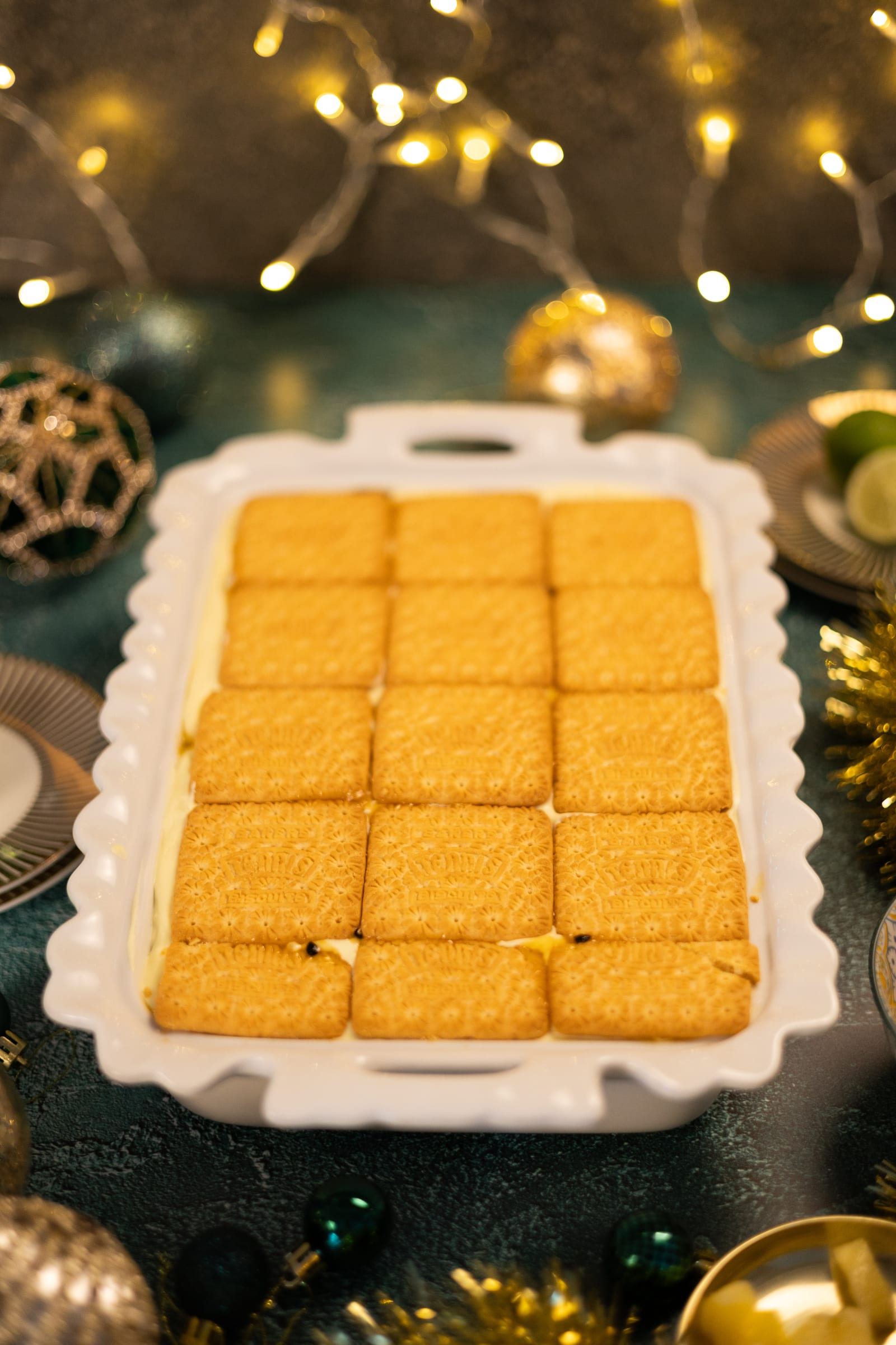 Tennis biscuits layered in the dish before the filling goes on