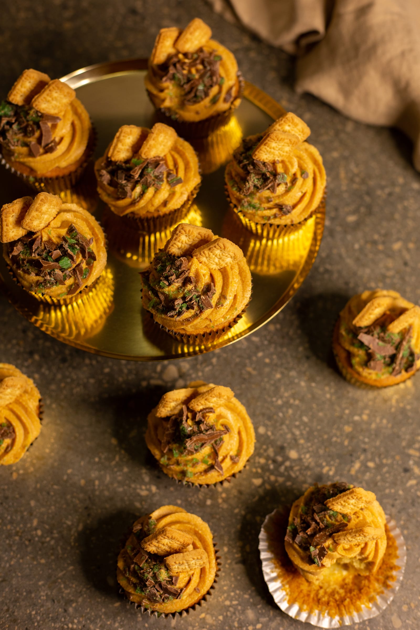 Cupcakes on a gold platter, from above