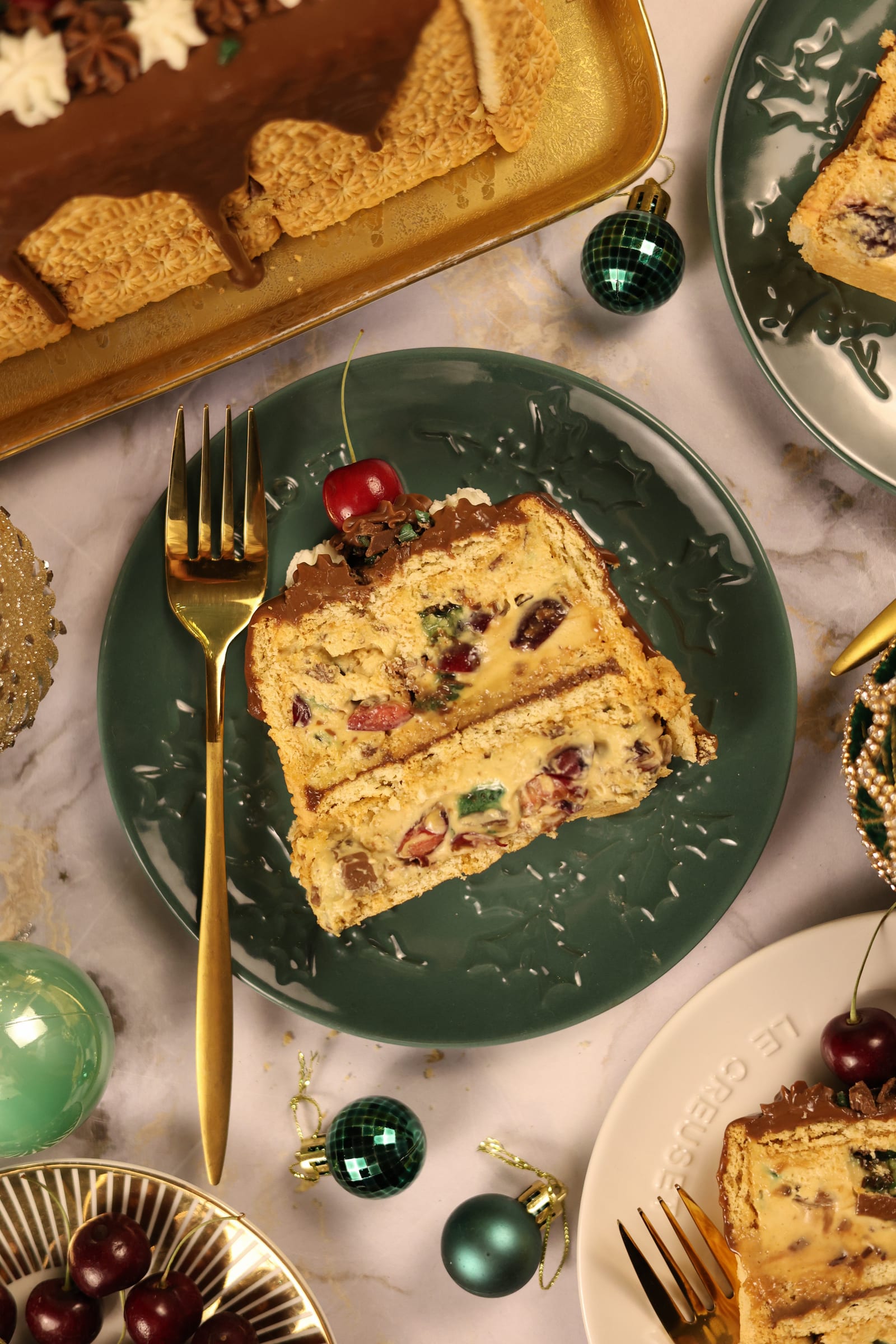 A slice of the showstopper on a green plate, from above