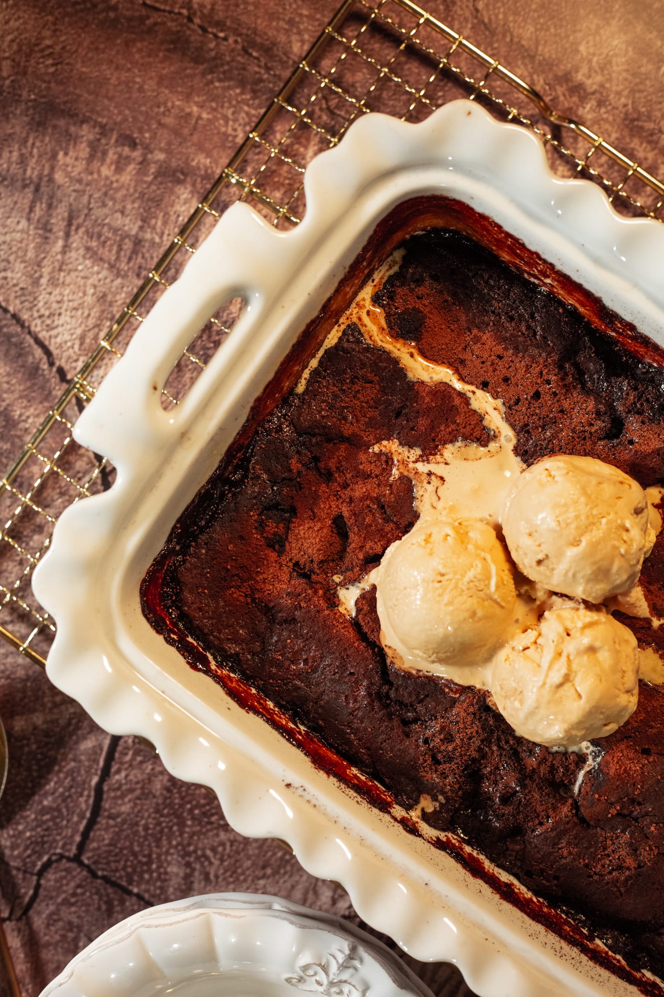Ice cream melting into the chocolate pudding