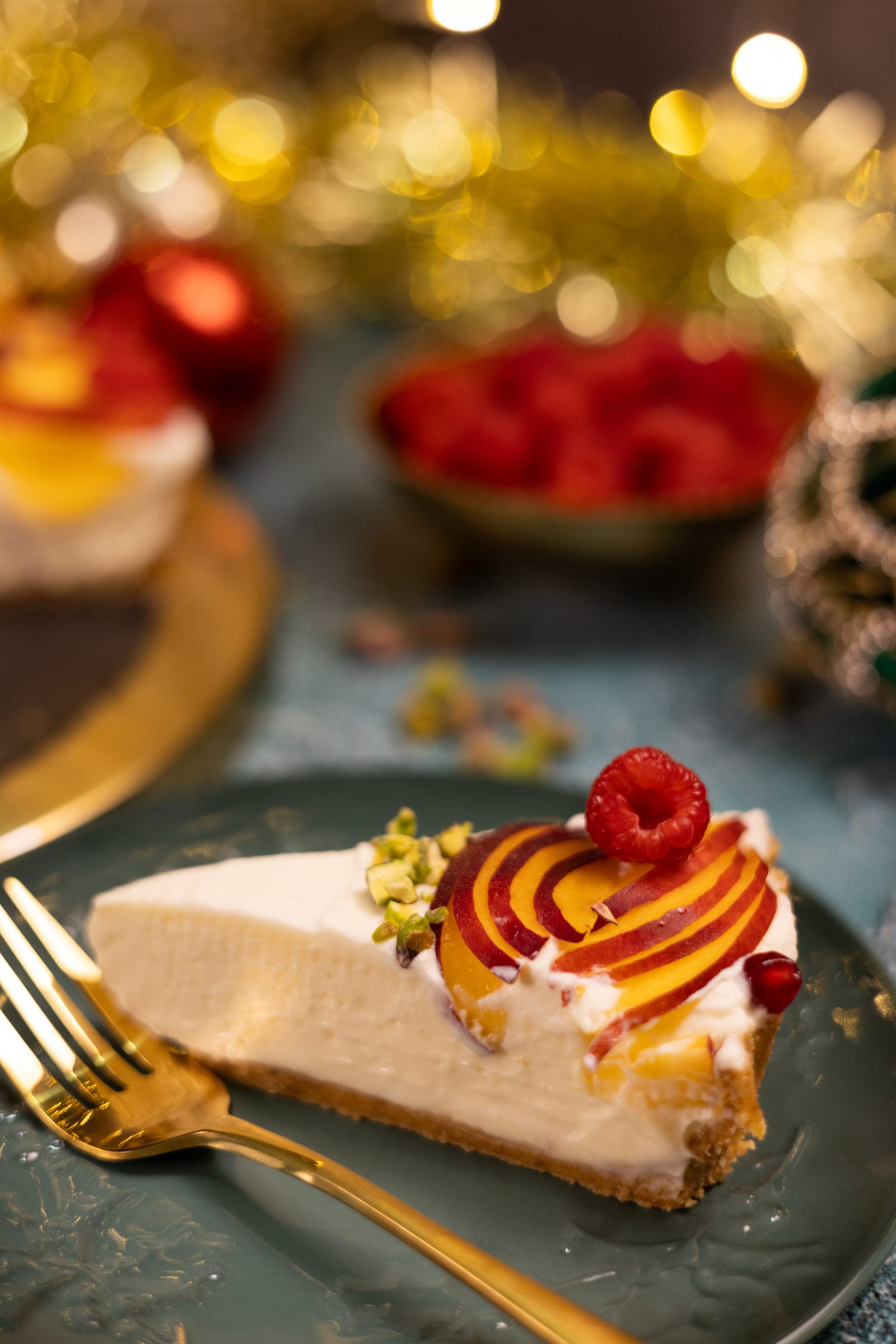 A slice of Cremora tart on a plate with a gold fork