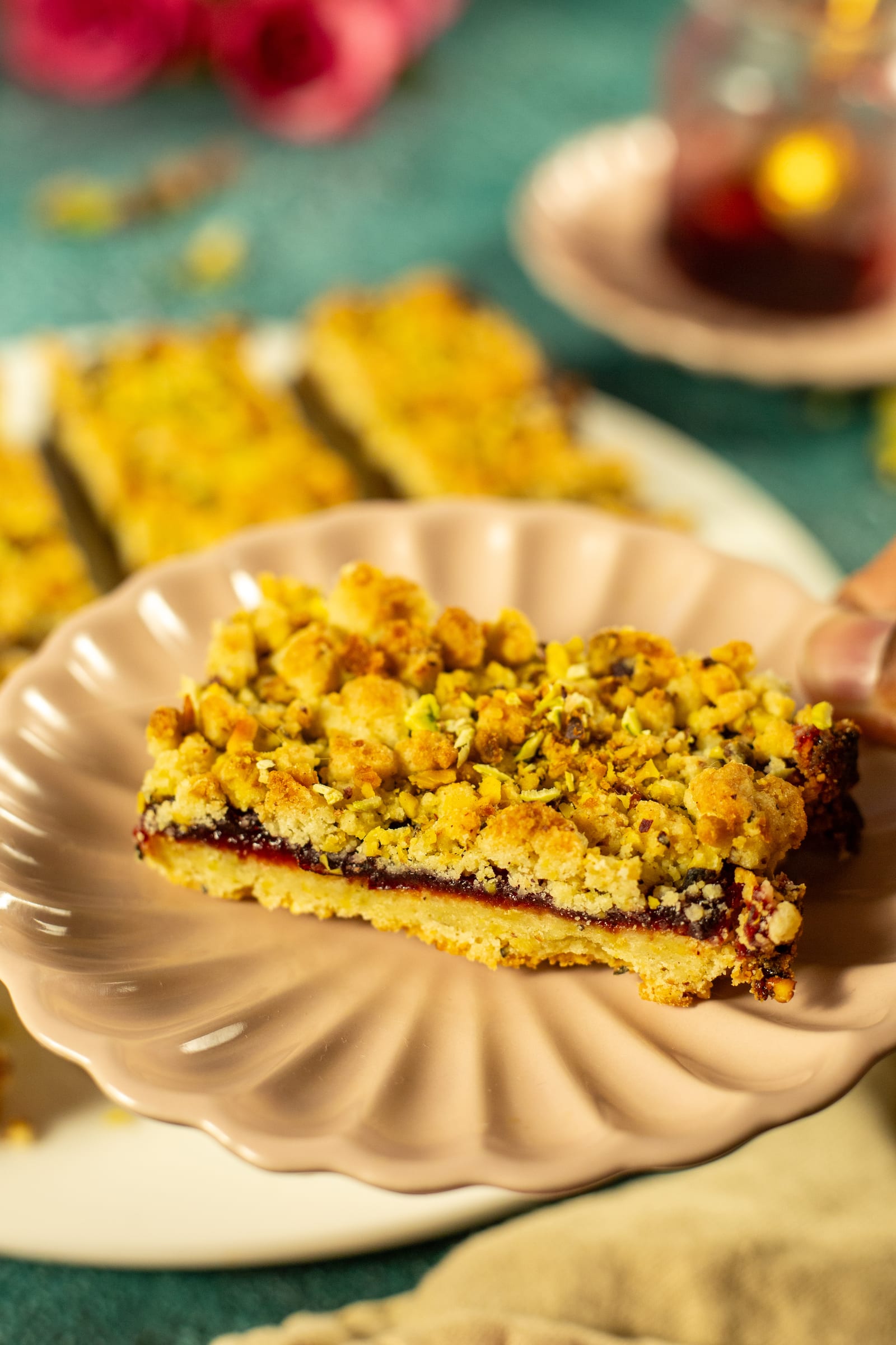 A Hungarian tart bar on a pink scalloped plate