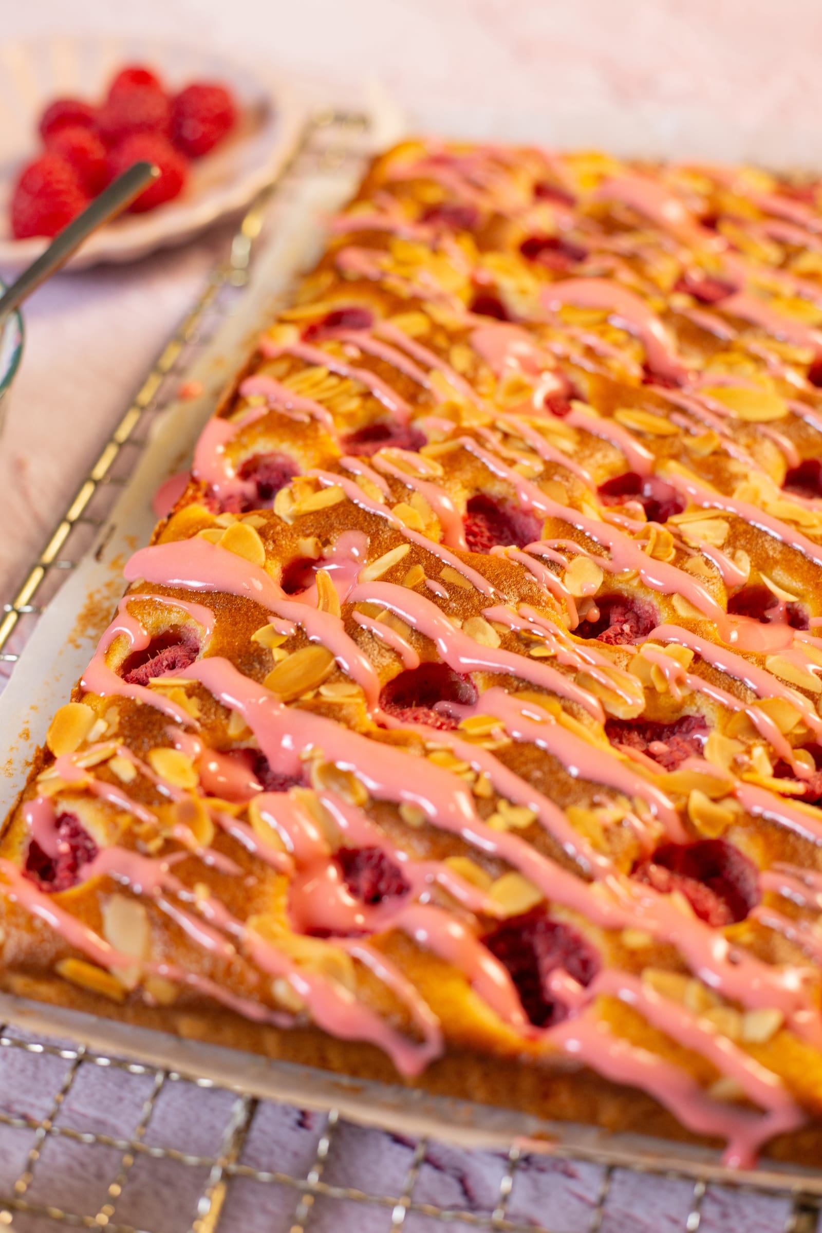 The cake drizzled with raspberry icing
