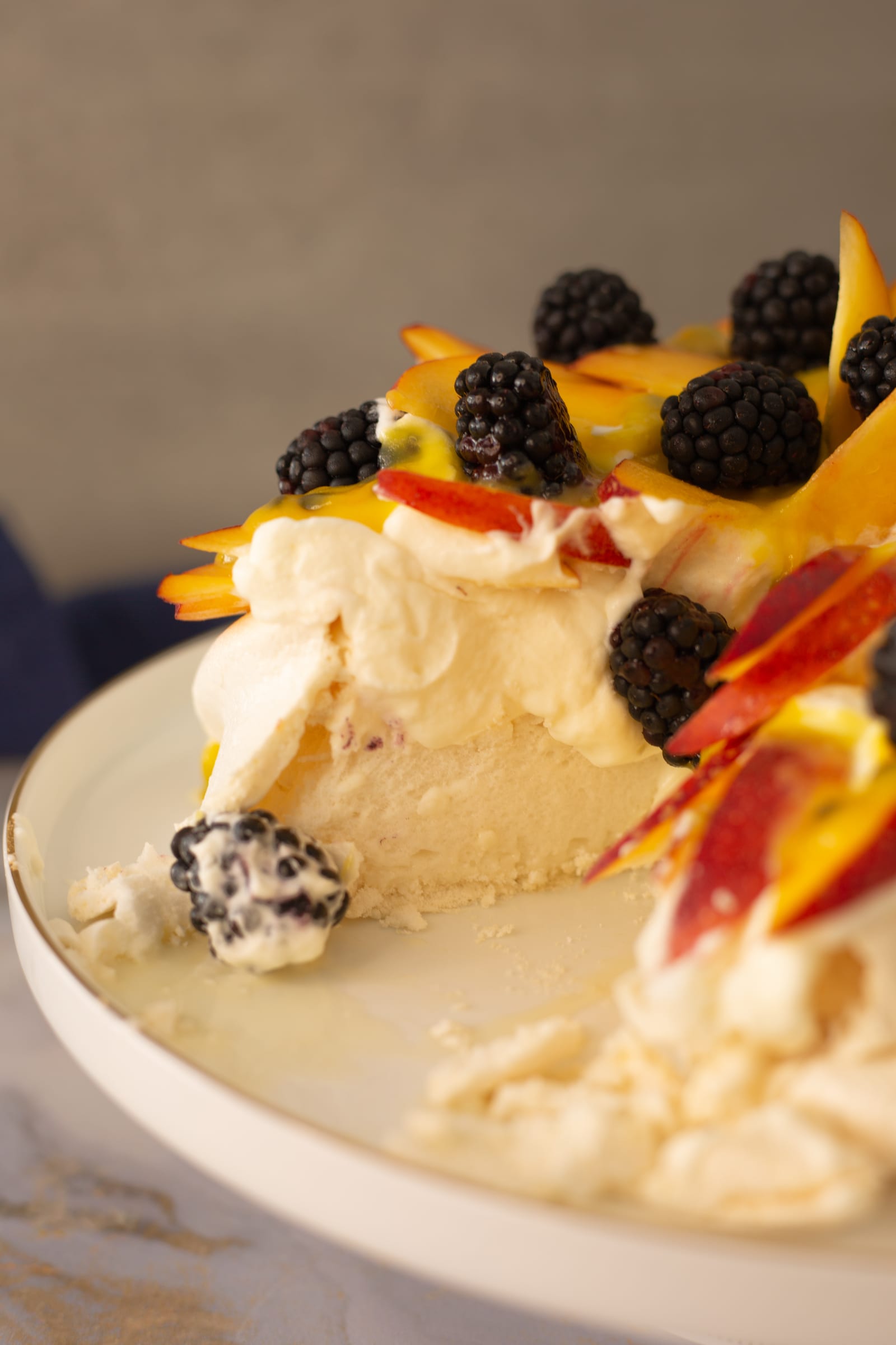 The pavlova cut open to show its soft marshmallowy centre