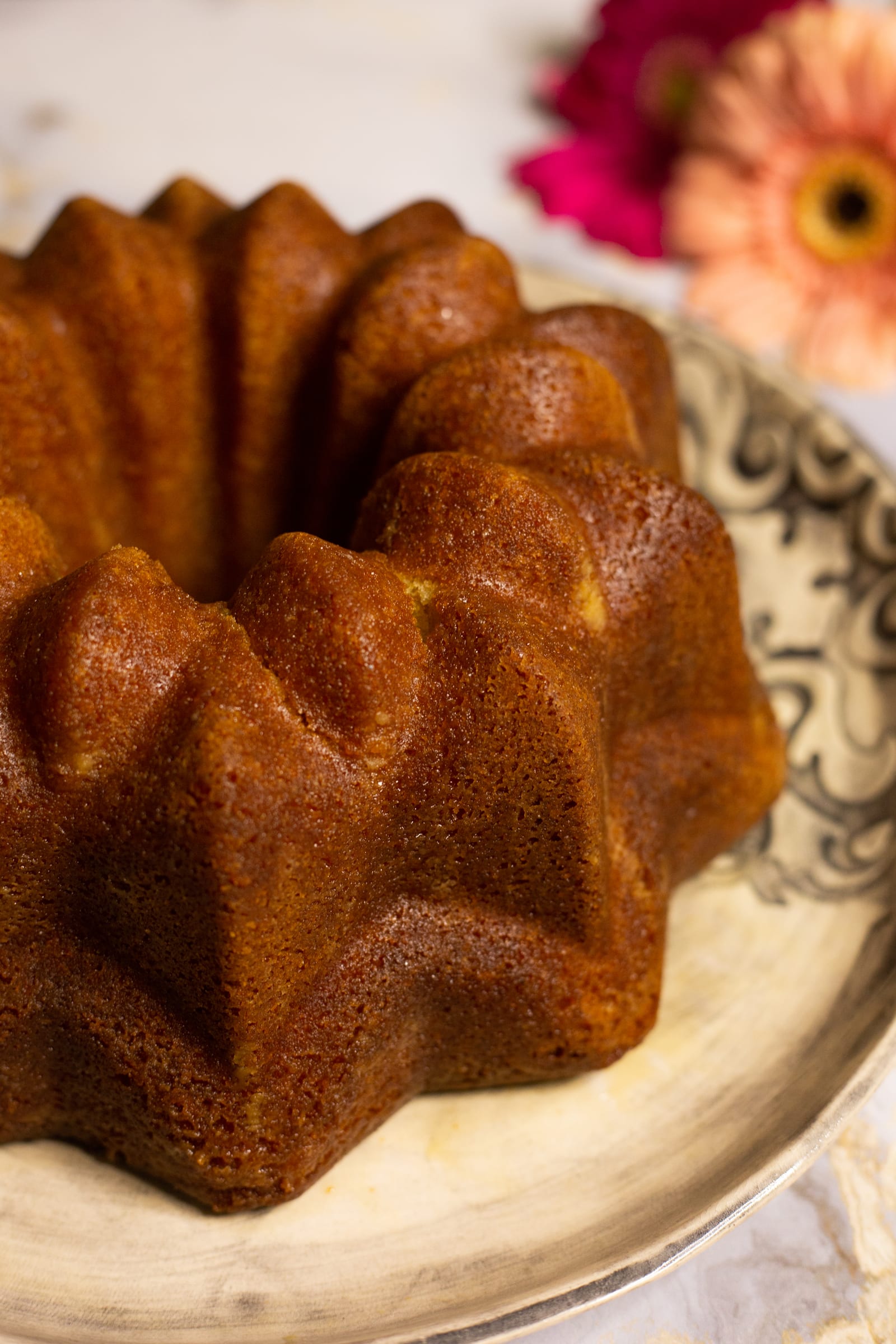 Close-up of the sticky, glossy ridges of a Kentucky butter cake