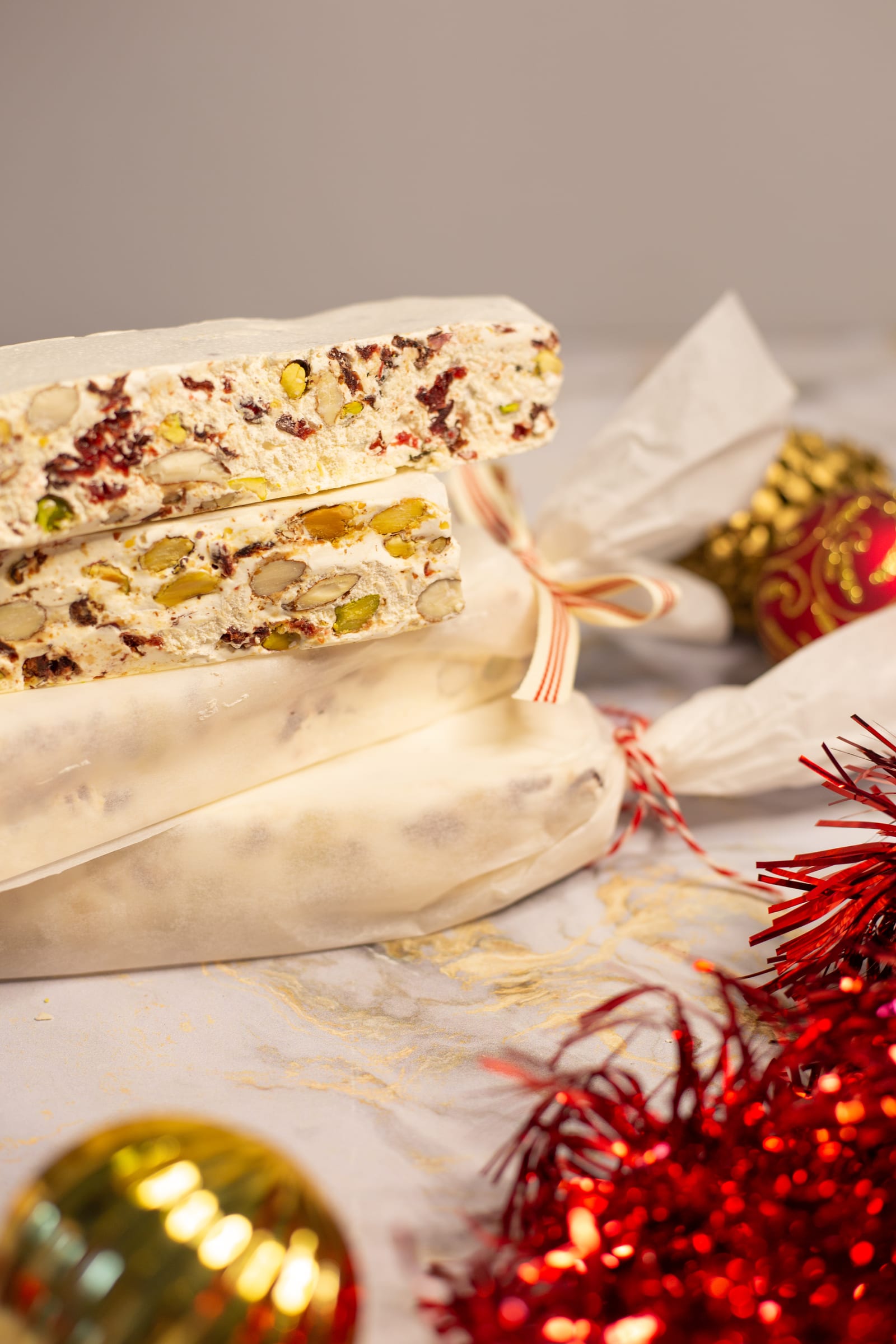 Nougat wrapped in paper and tied with string, ready to give as a gift