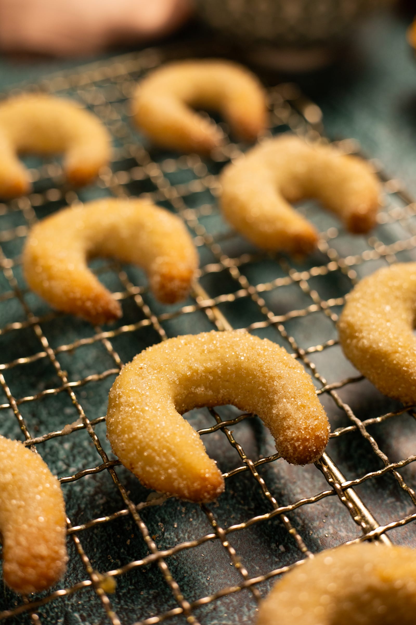 Close-up of a sugar-dusted cashew nut crescent