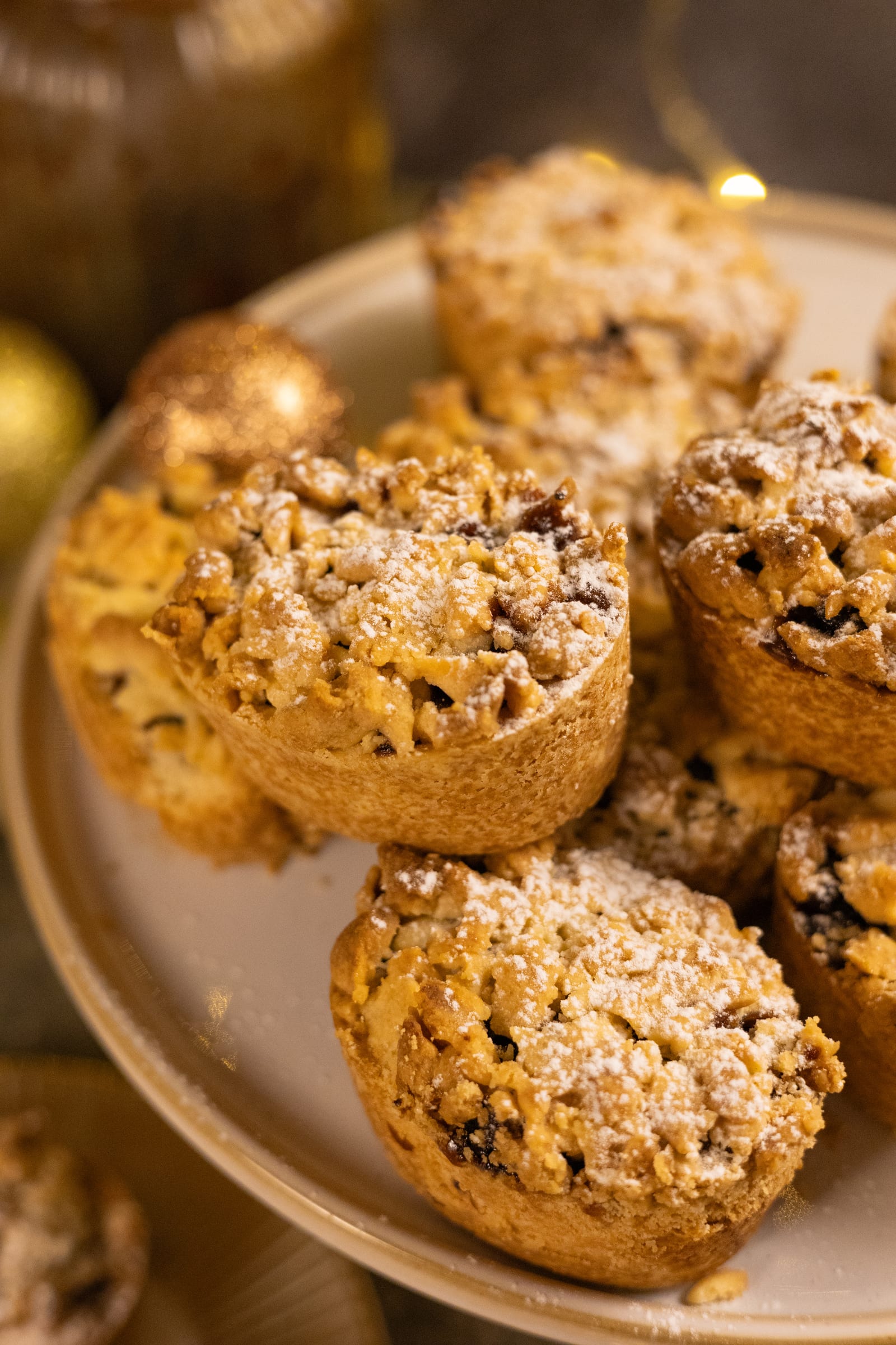 Close-up of crumbly, sugar-dusted mince pies
