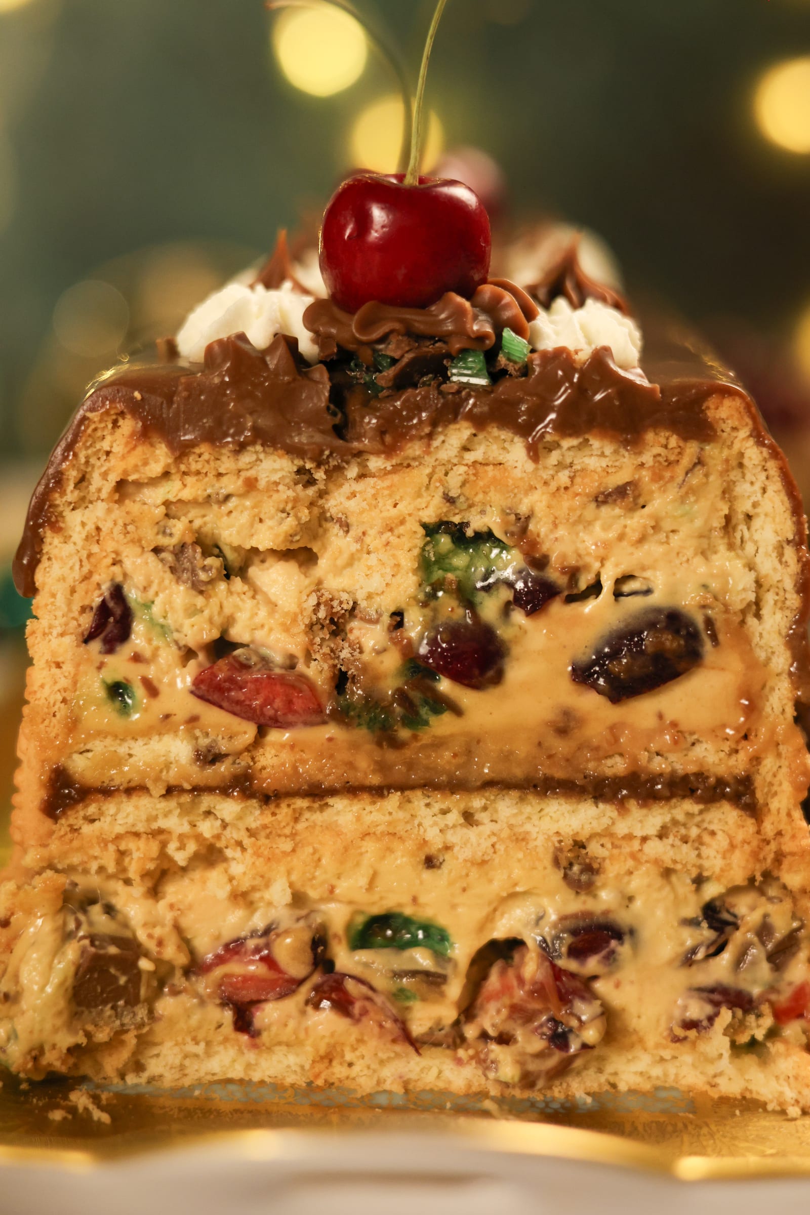 The loaf cut open to show its creamy, fruit-studded filling