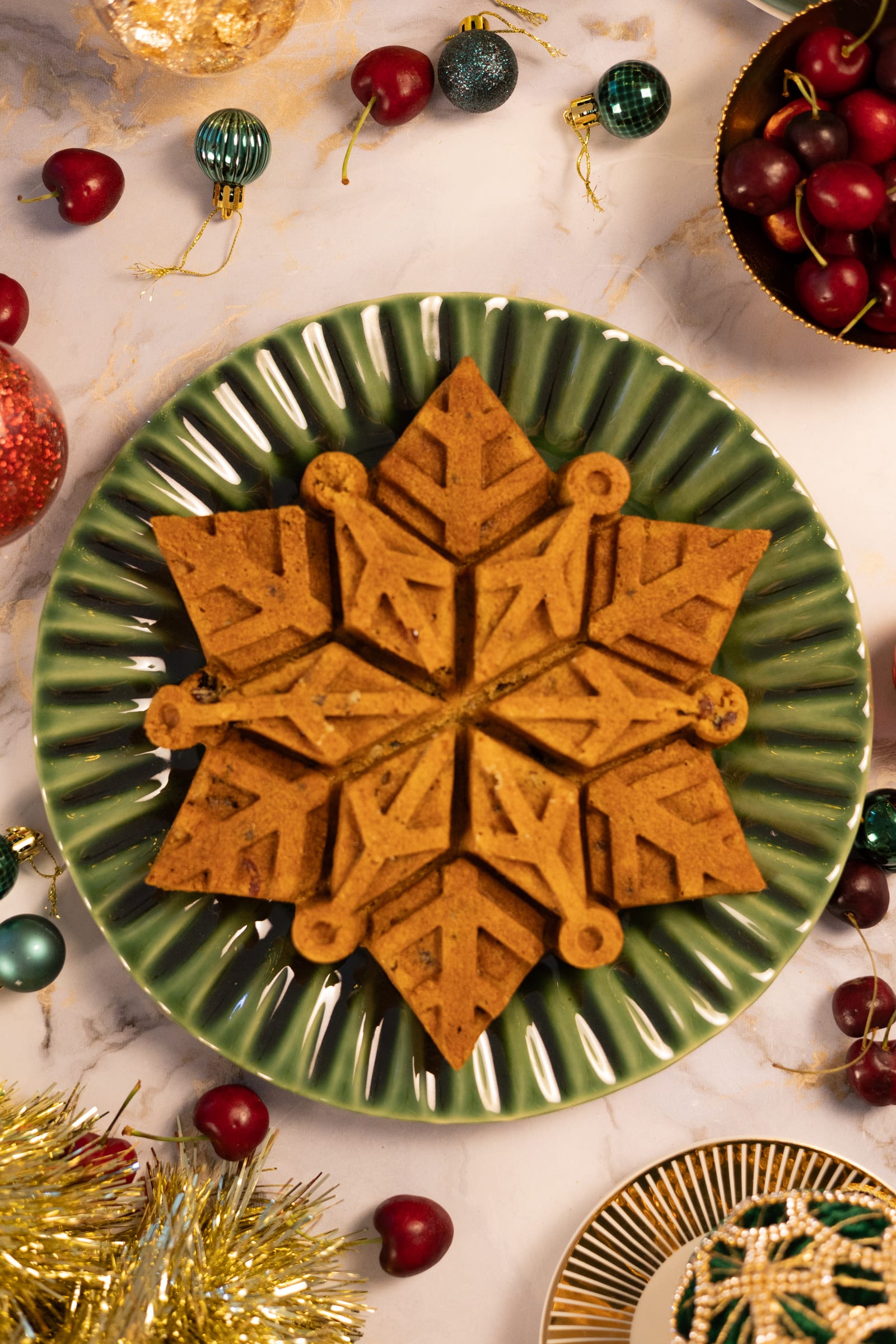 The snowflake fruitcake before dusting with icing sugar, from above