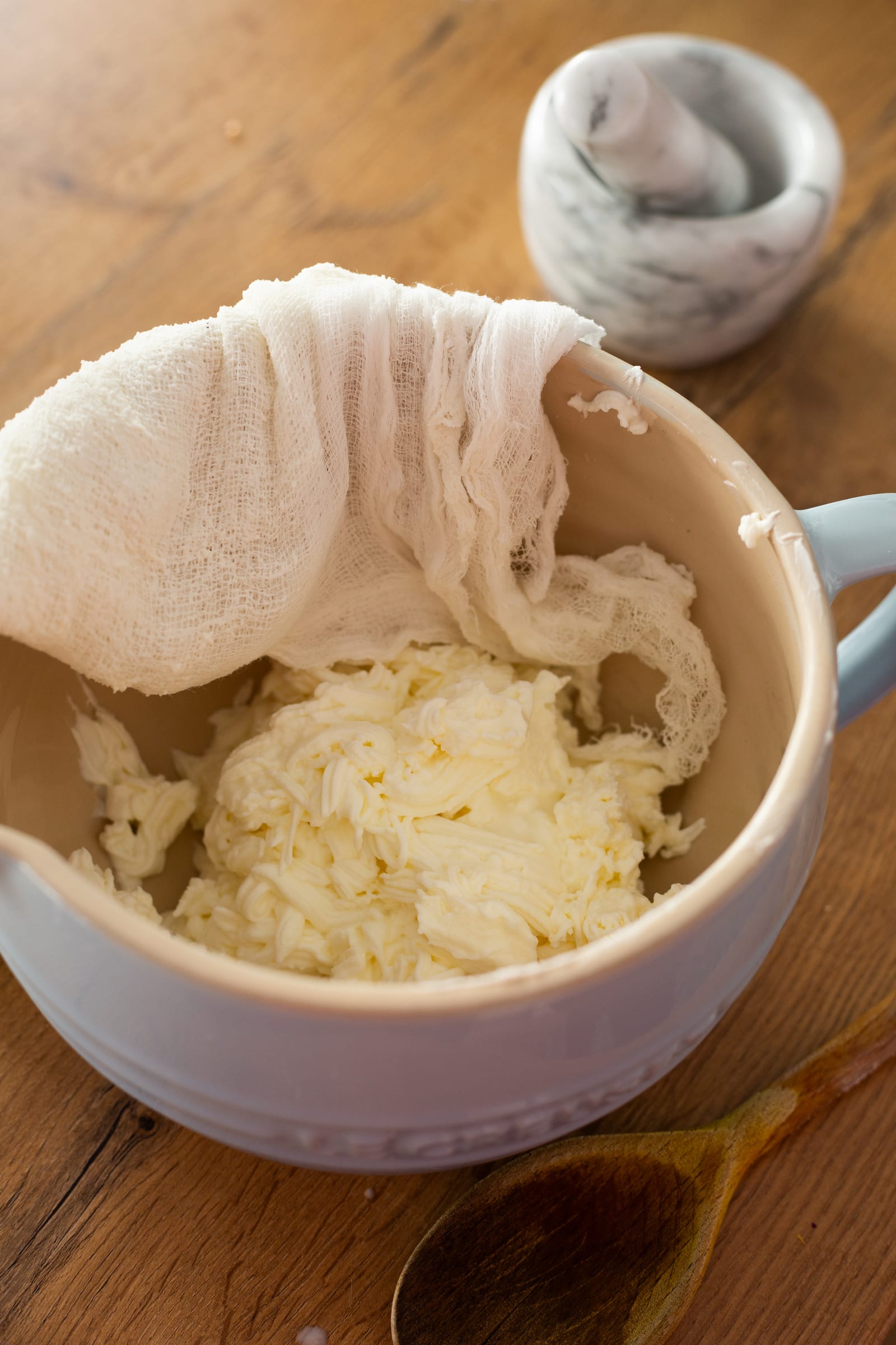 Labneh draining in muslin for the ganache